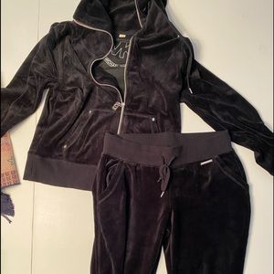 Black Michael Kors pants and zip up